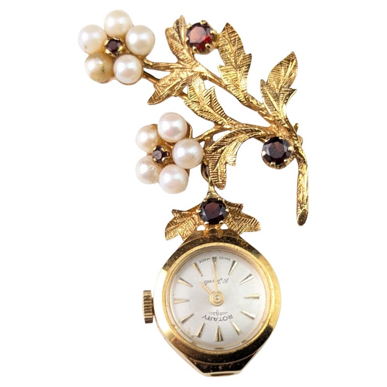 Vintage 9ct gold Rotary pendant watch, floral, Garnet and Pearl