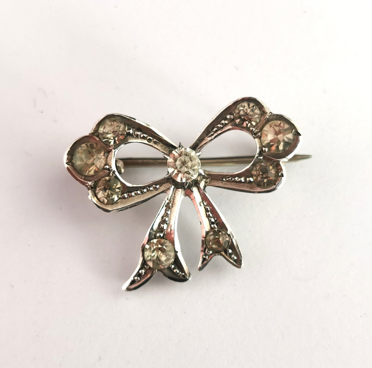 Antique sterling silver and paste bow brooch, Edwardian