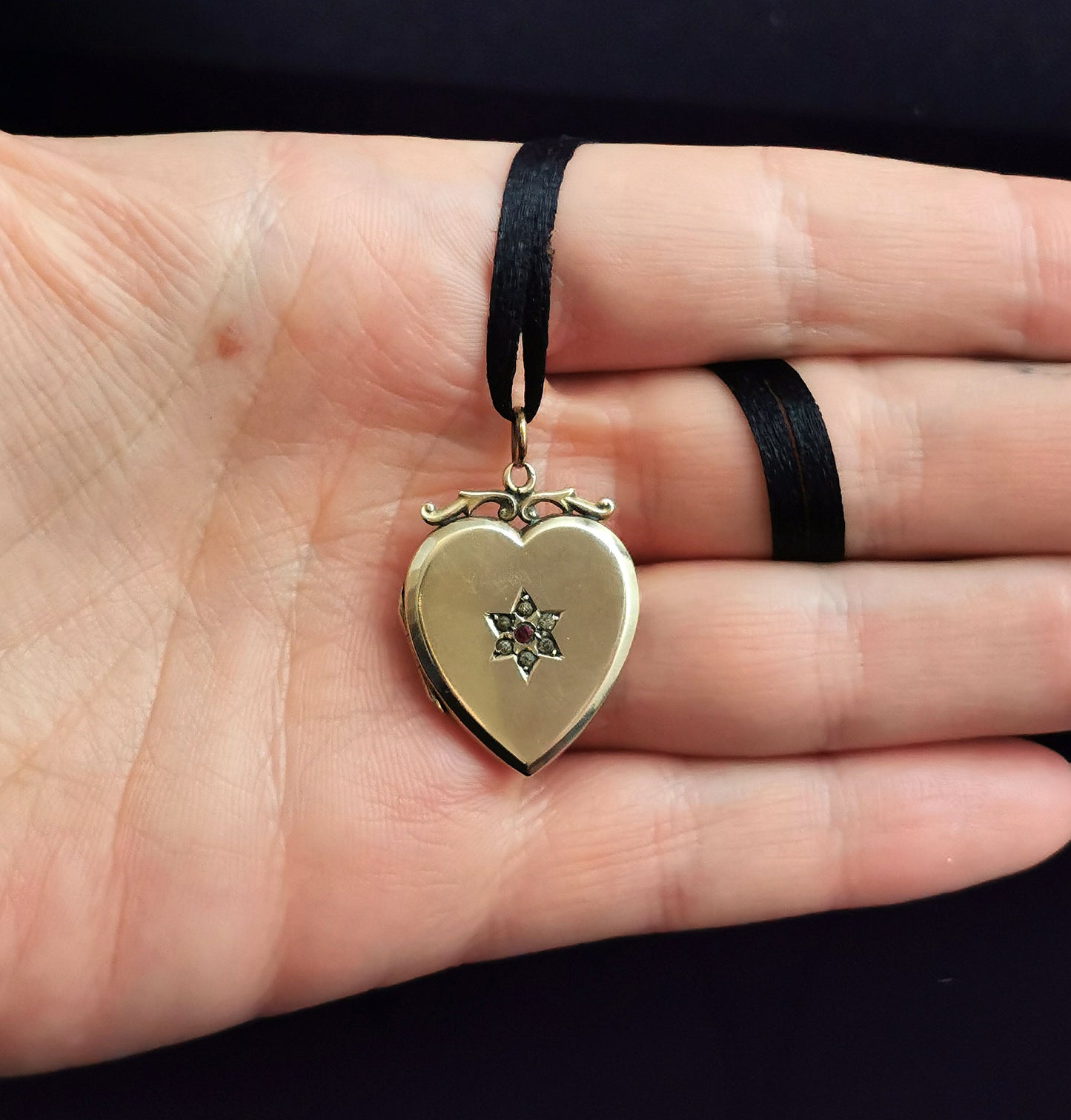 Antique heart shaped locket, 9ct gold front and back, paste star