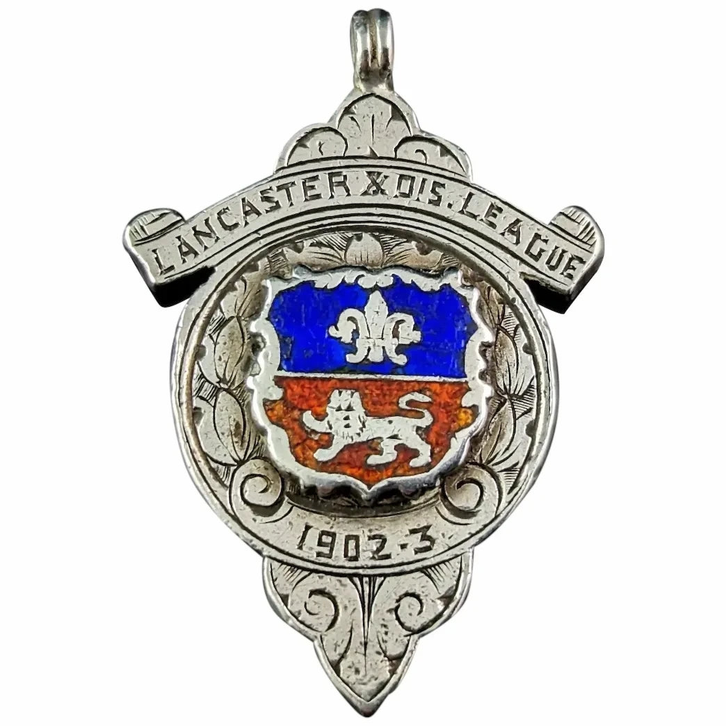 Antique sterling silver and enamel fob pendant, Lion and Fleur de Lis