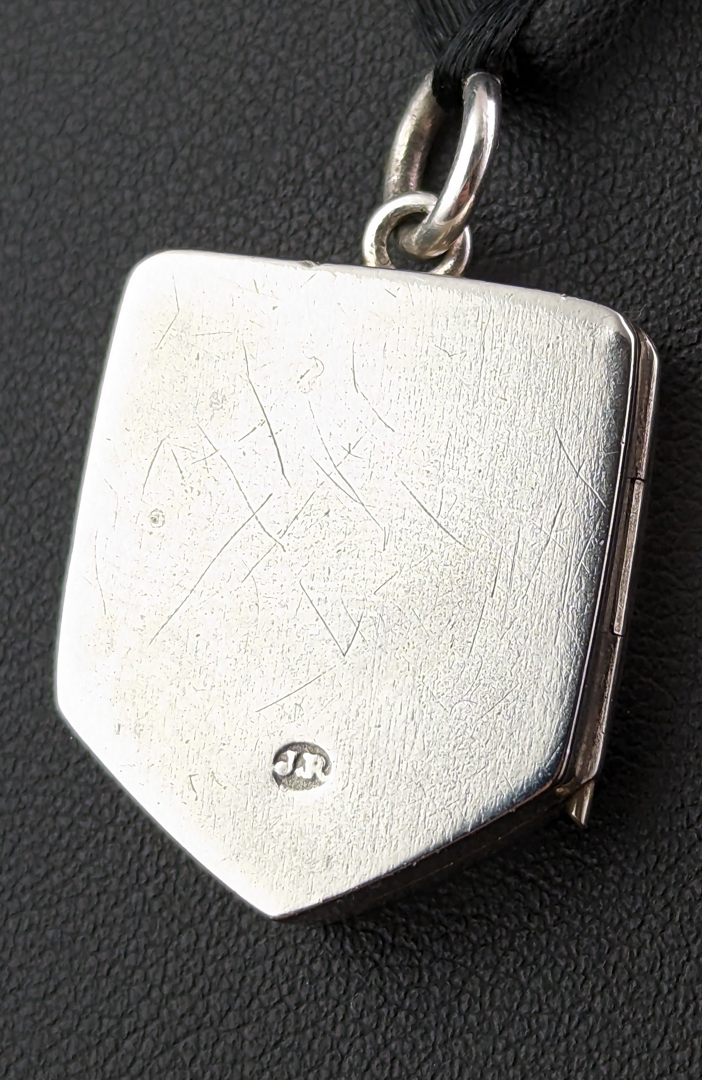 Antique silver locket pendant, Shield shaped, leaf engraved