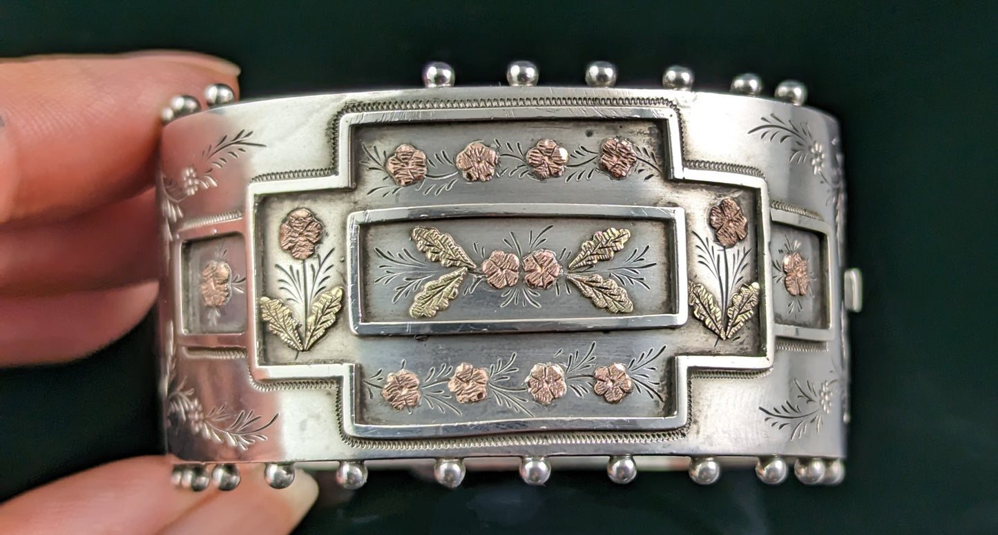 Antique Victorian aesthetic silver cuff bangle, 9ct gold floral design