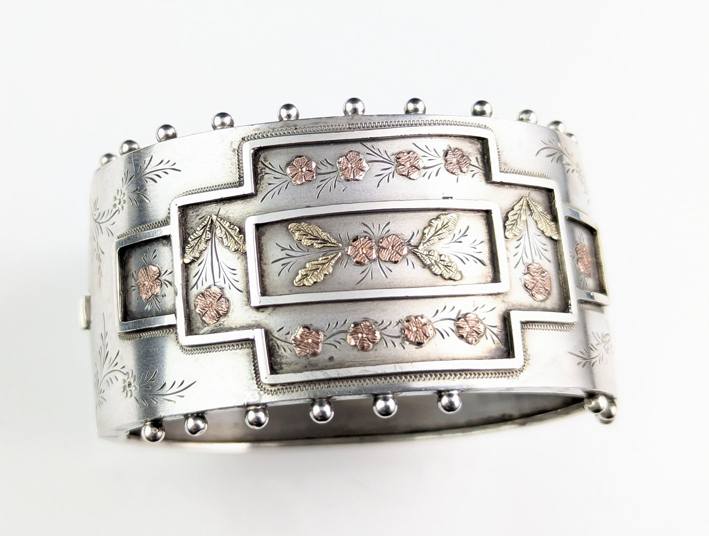 Antique Victorian aesthetic silver cuff bangle, 9ct gold floral design