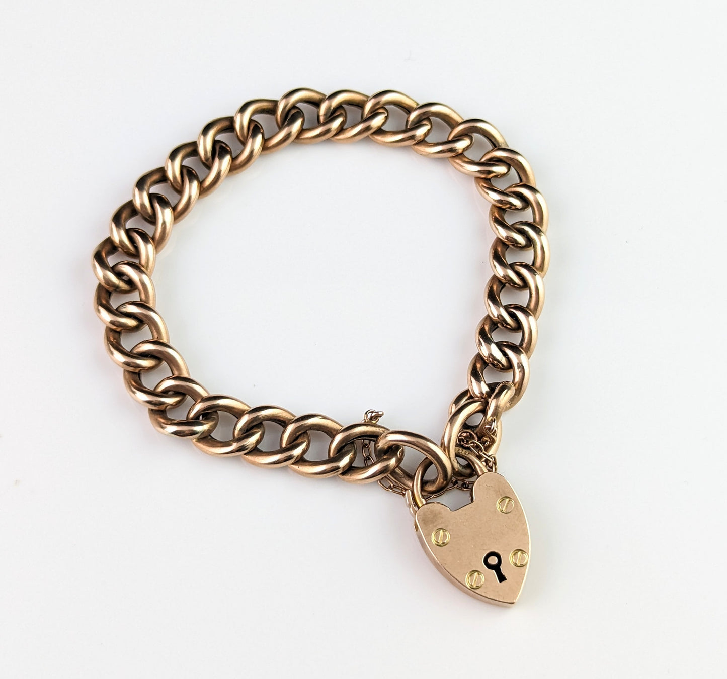 Antique 9ct gold curb link bracelet, Edwardian, Heart padlock