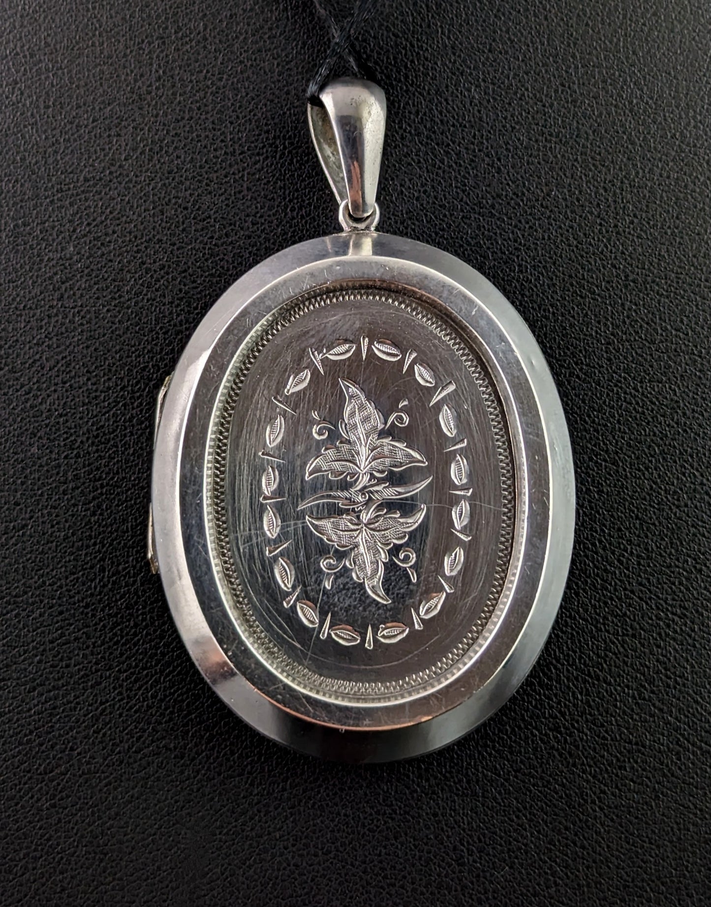 Antique Victorian silver locket, floral and foliate, large