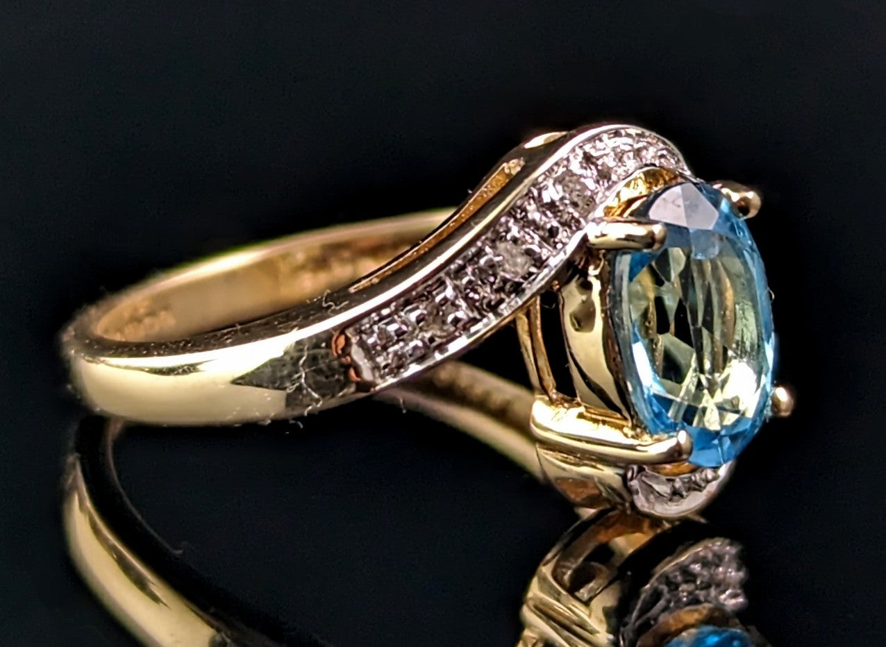 Vintage Blue Topaz and Diamond crossover ring, 9ct gold