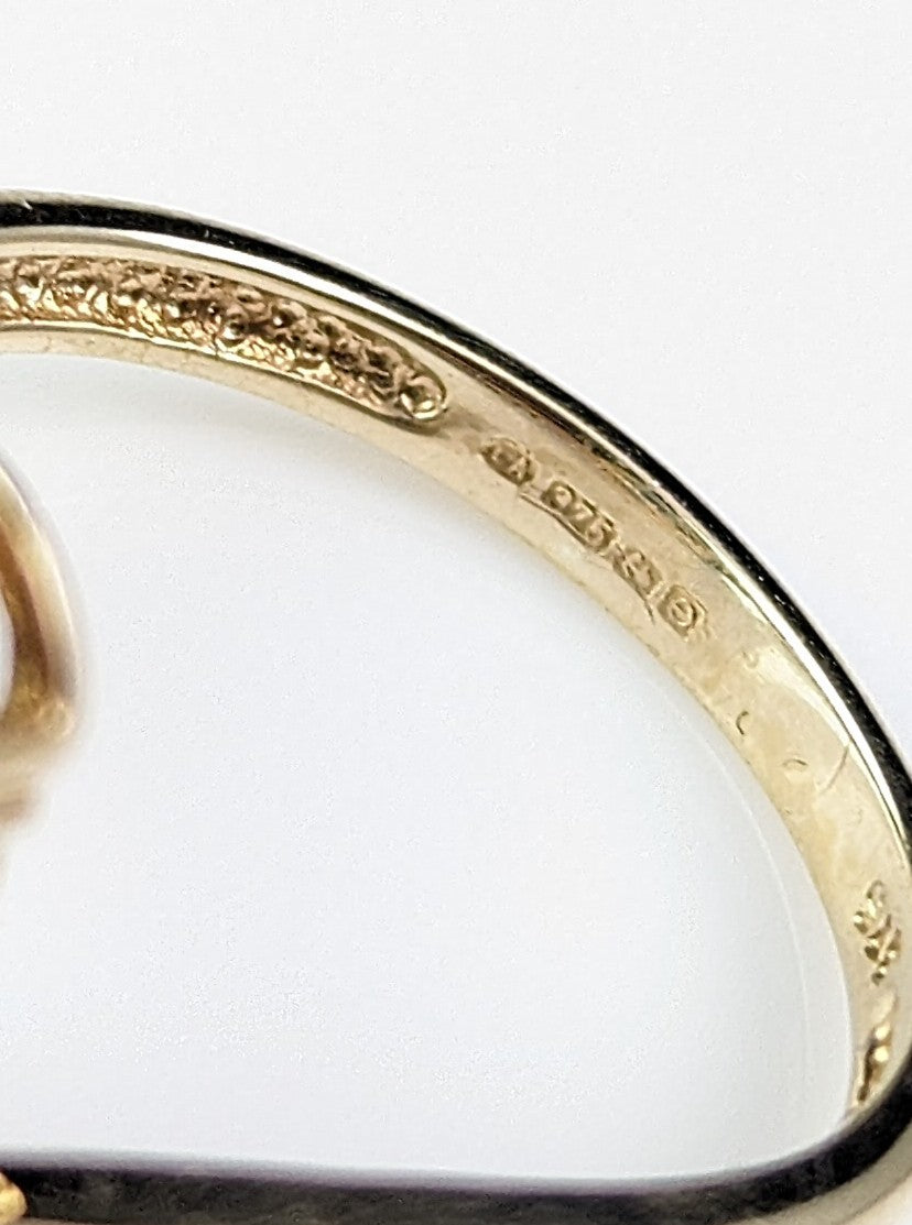 Vintage Blue Topaz and Diamond crossover ring, 9ct gold