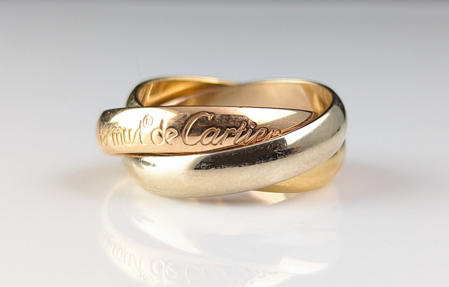 Vintage Les Must de Cartier Trinity band ring, tri colour 18ct gold, boxed