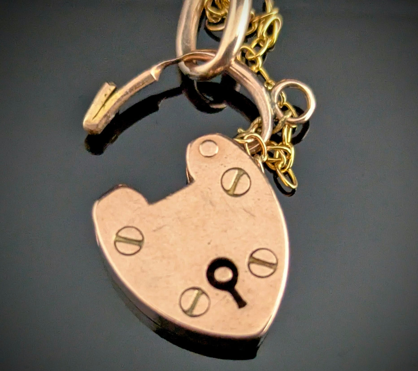 Antique 9ct gold curb link bracelet, Heart padlock