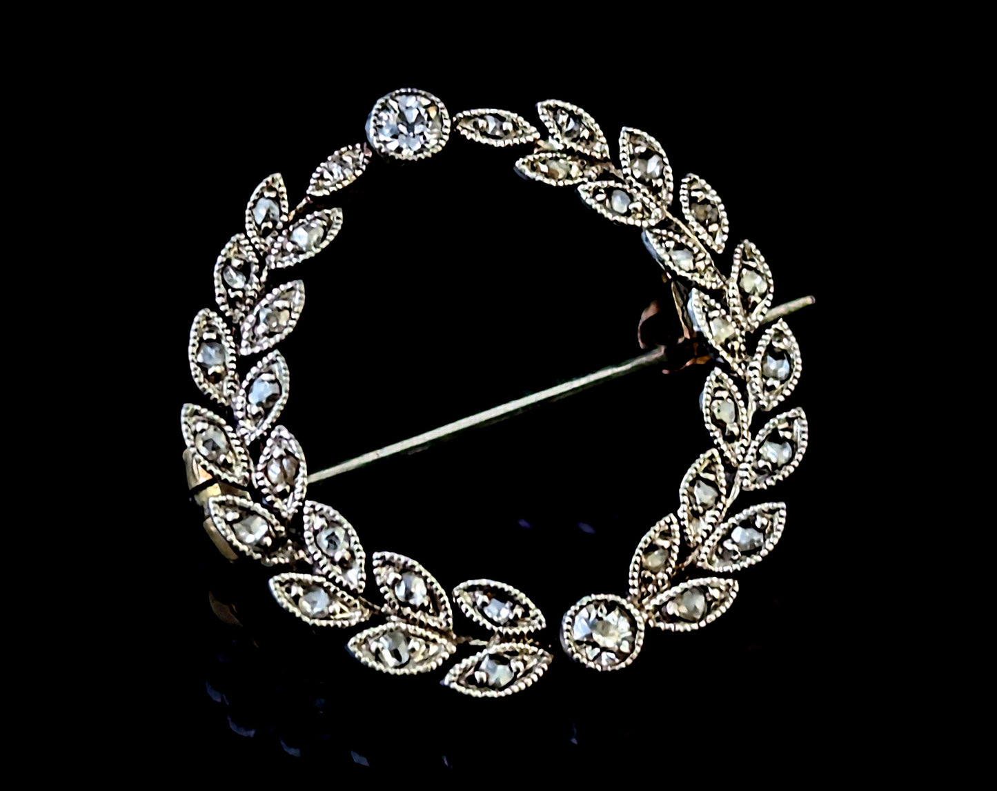 Antique diamond wreath brooch, 9ct gold and platinum