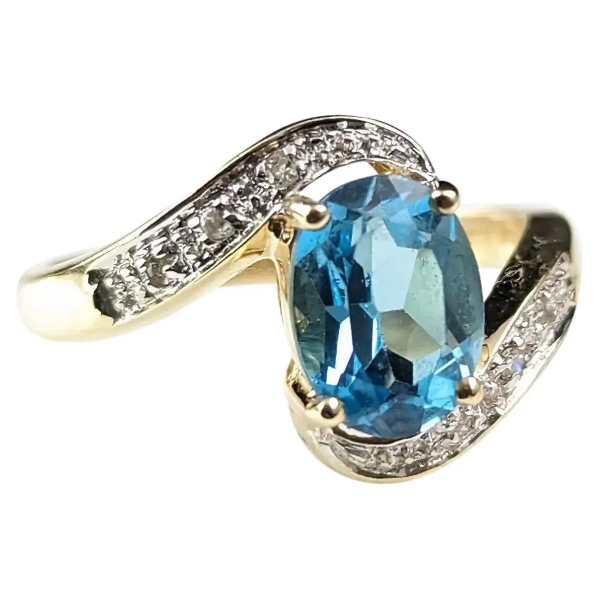 Vintage Blue Topaz and Diamond crossover ring, 9ct gold
