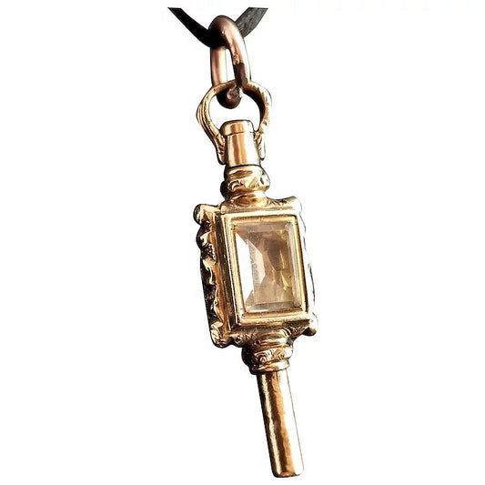 Antique Victorian 9ct gold watch key pendant, paste Stone