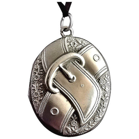Victorian silver locket, buckle and flowers