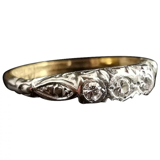 Art Deco three stone diamond ring, 18ct gold and platinum