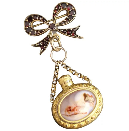 Antique agate scent bottle and bohemian garnet bow brooch