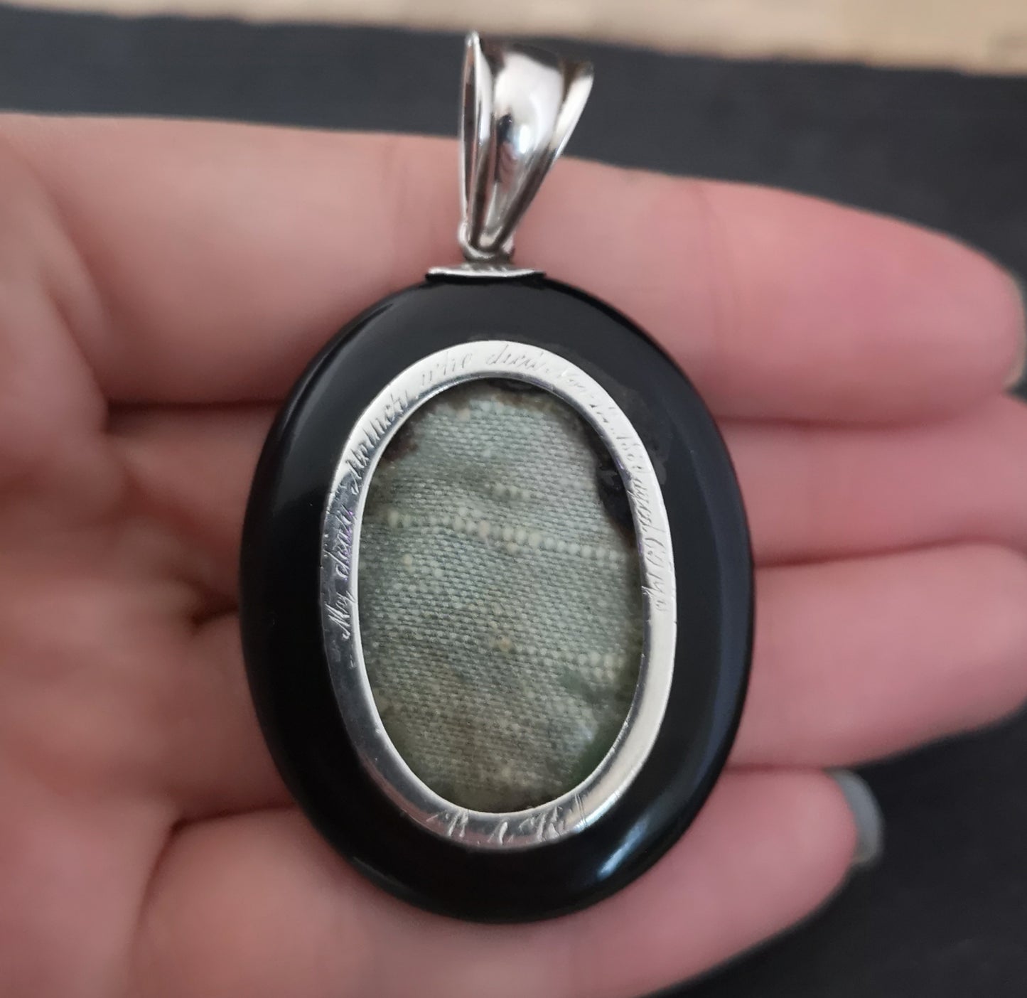 Victorian onyx and silver mourning locket