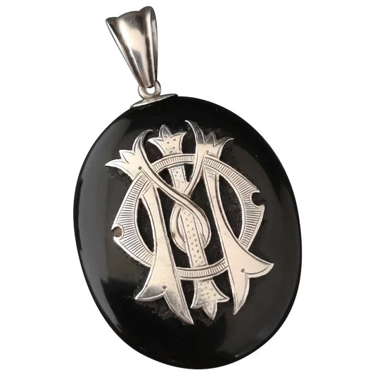 Victorian onyx and silver mourning locket