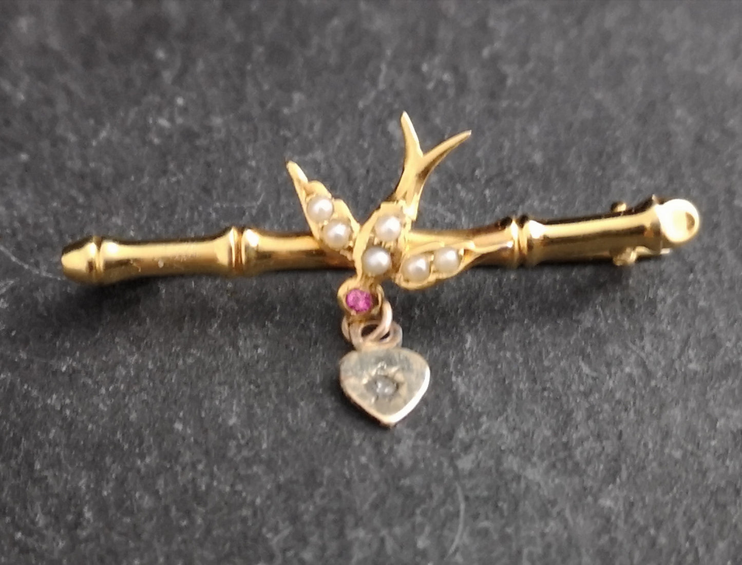 Antique Irish 9ct gold swallow brooch, Ruby, pearl and diamond