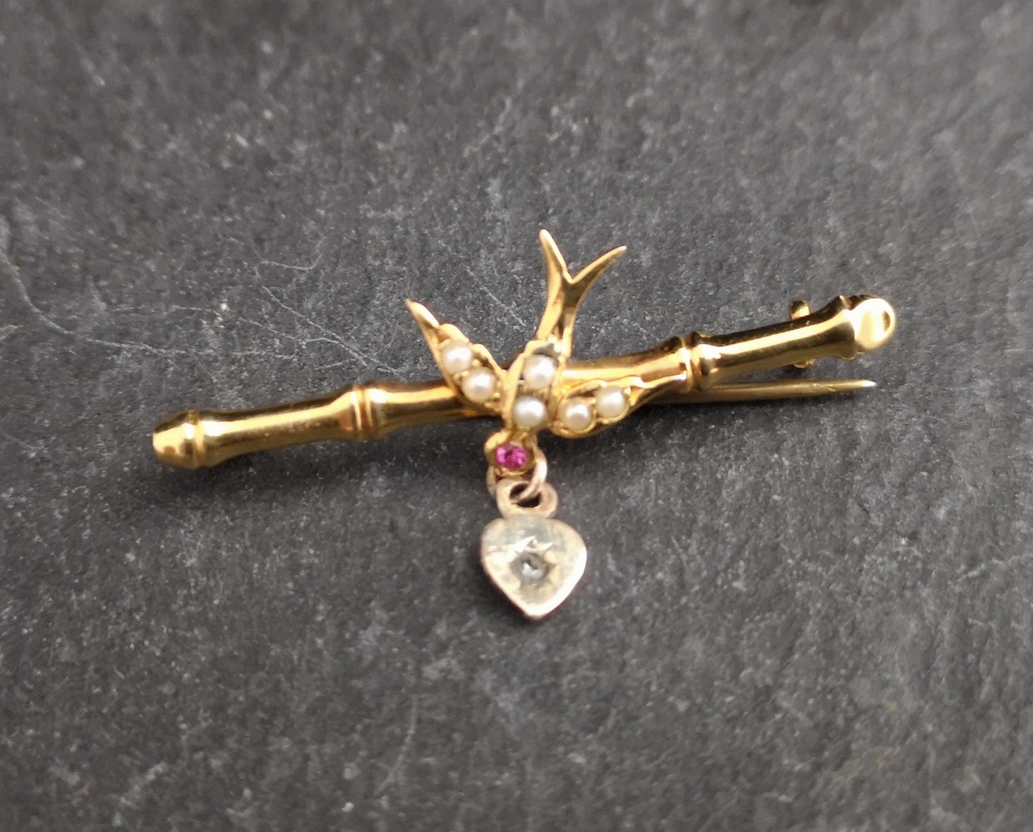 Antique Irish 9ct gold swallow brooch, Ruby, pearl and diamond
