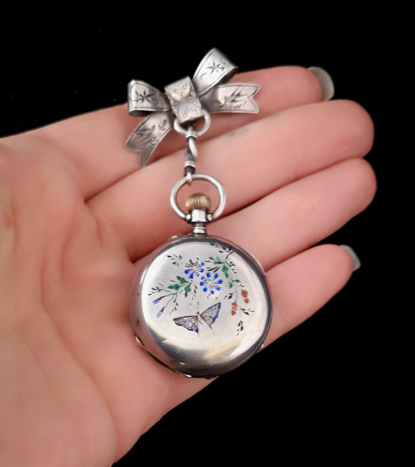 Victorian pocket watch, silver and enamel, bow brooch
