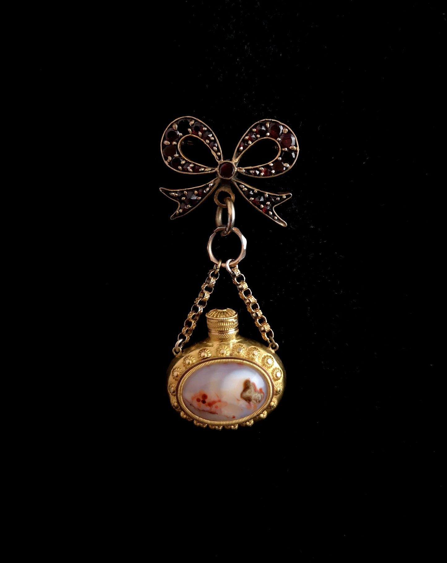 Antique agate scent bottle and bohemian garnet bow brooch