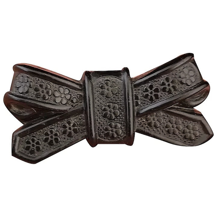 Victorian Whitby jet bow brooch, forget me not