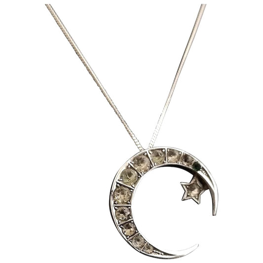 Antique Victorian silver crescent pendant, paste and emerald