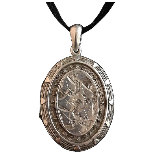 Antique Victorian silver locket, ivy leaf