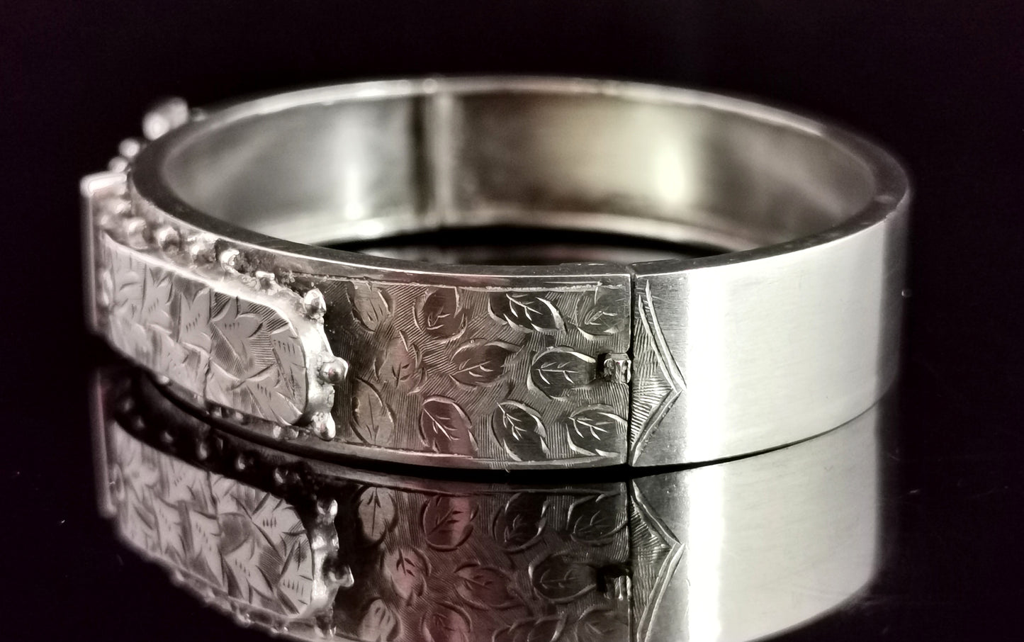 Victorian silver buckle bangle, ivy engraved