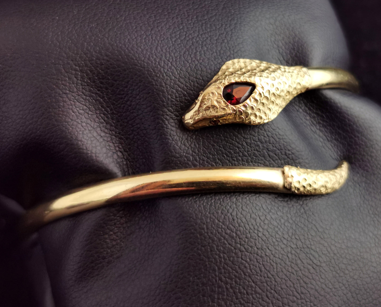 Vintage 9ct gold snake bangle, garnet