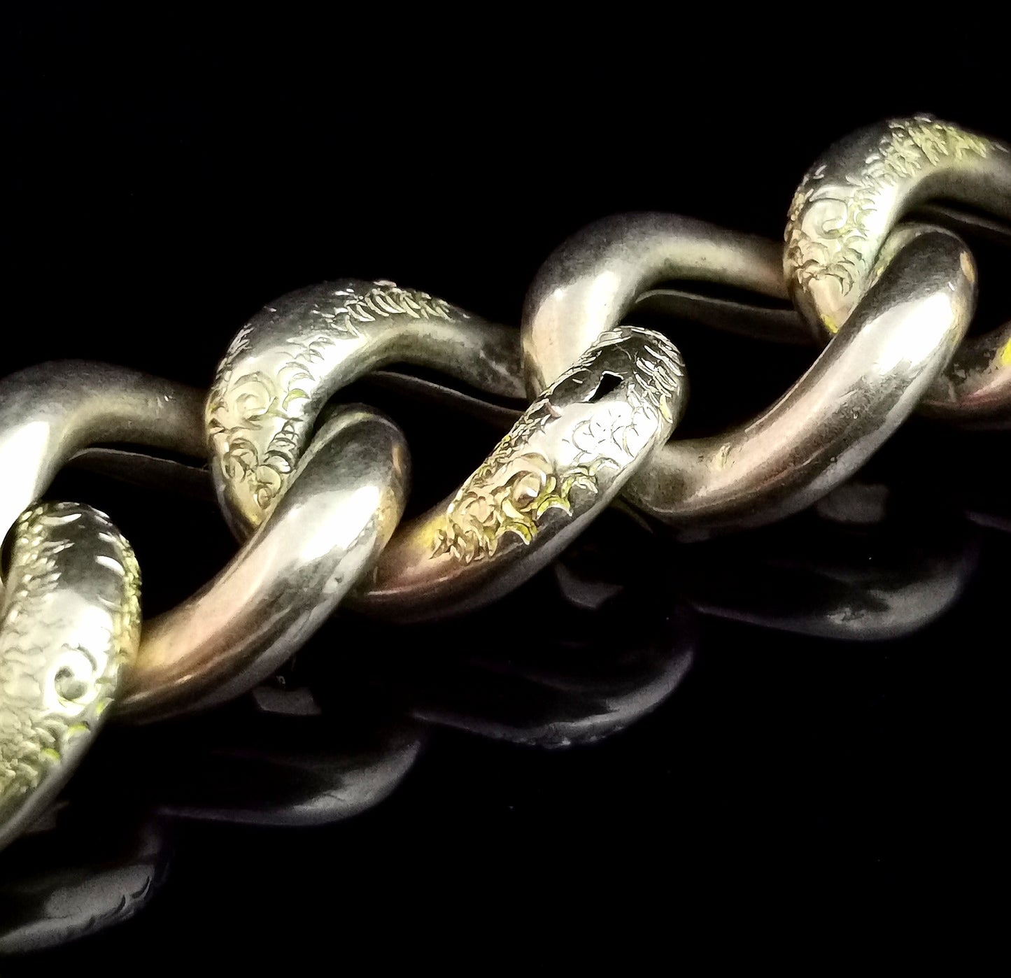 Antique 9ct gold curb link bracelet, Edwardian, spinning fobs