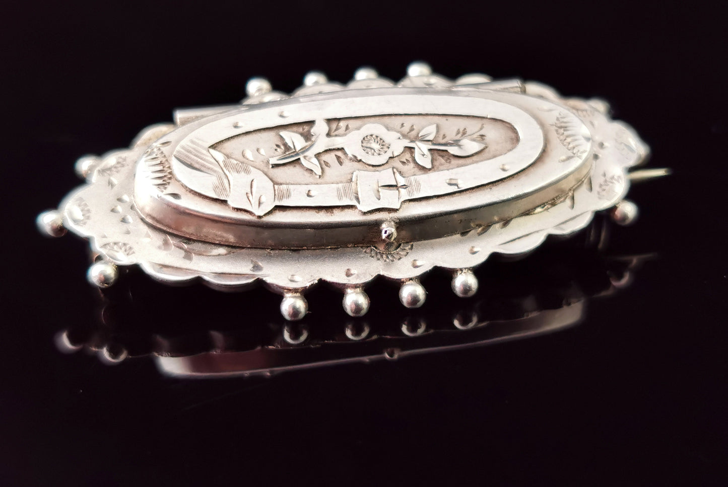 Antique silver locket brooch, Welsh, Hidden message