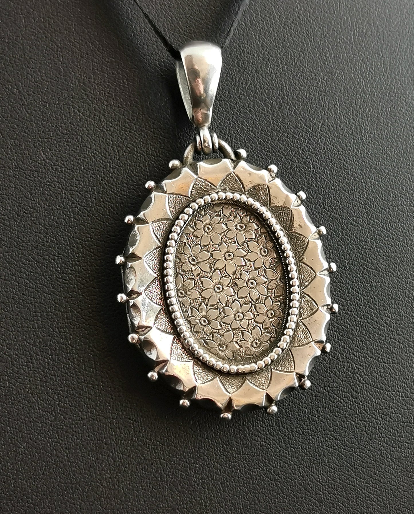 Antique Victorian silver locket pendant, Forget me not flowers
