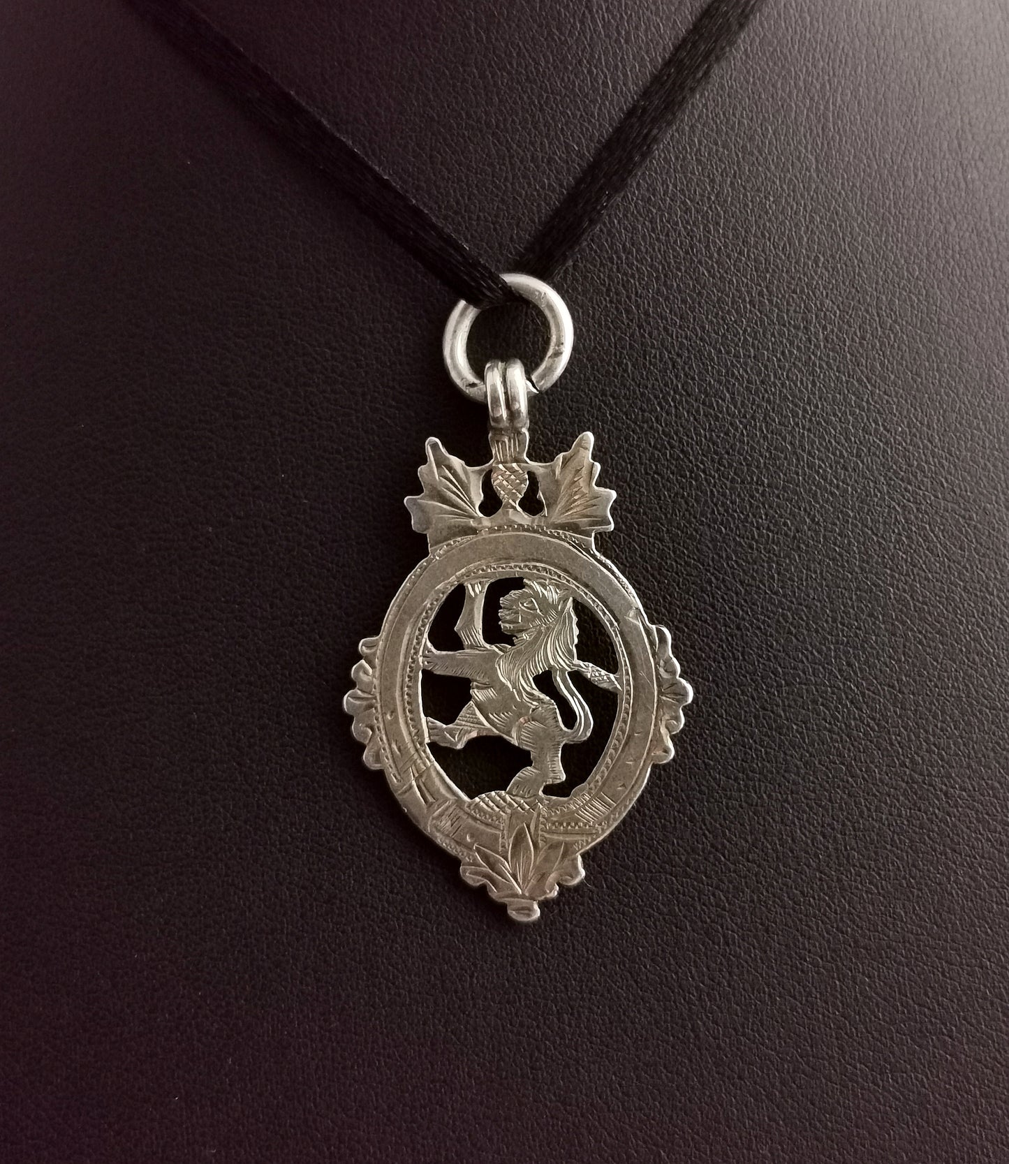 Vintage sterling silver fob pendant, Lion, Thistle and buckle