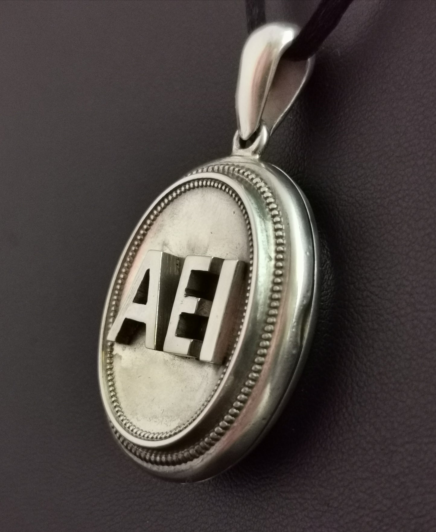 Victorian silver AEI locket, pendant, Amity, Eternity, Infinity