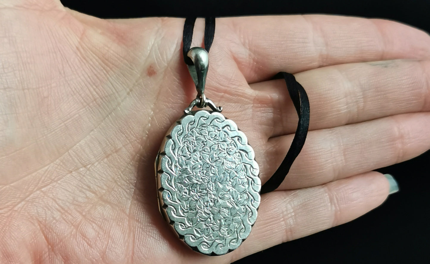 Victorian silver locket pendant, leaf engraved