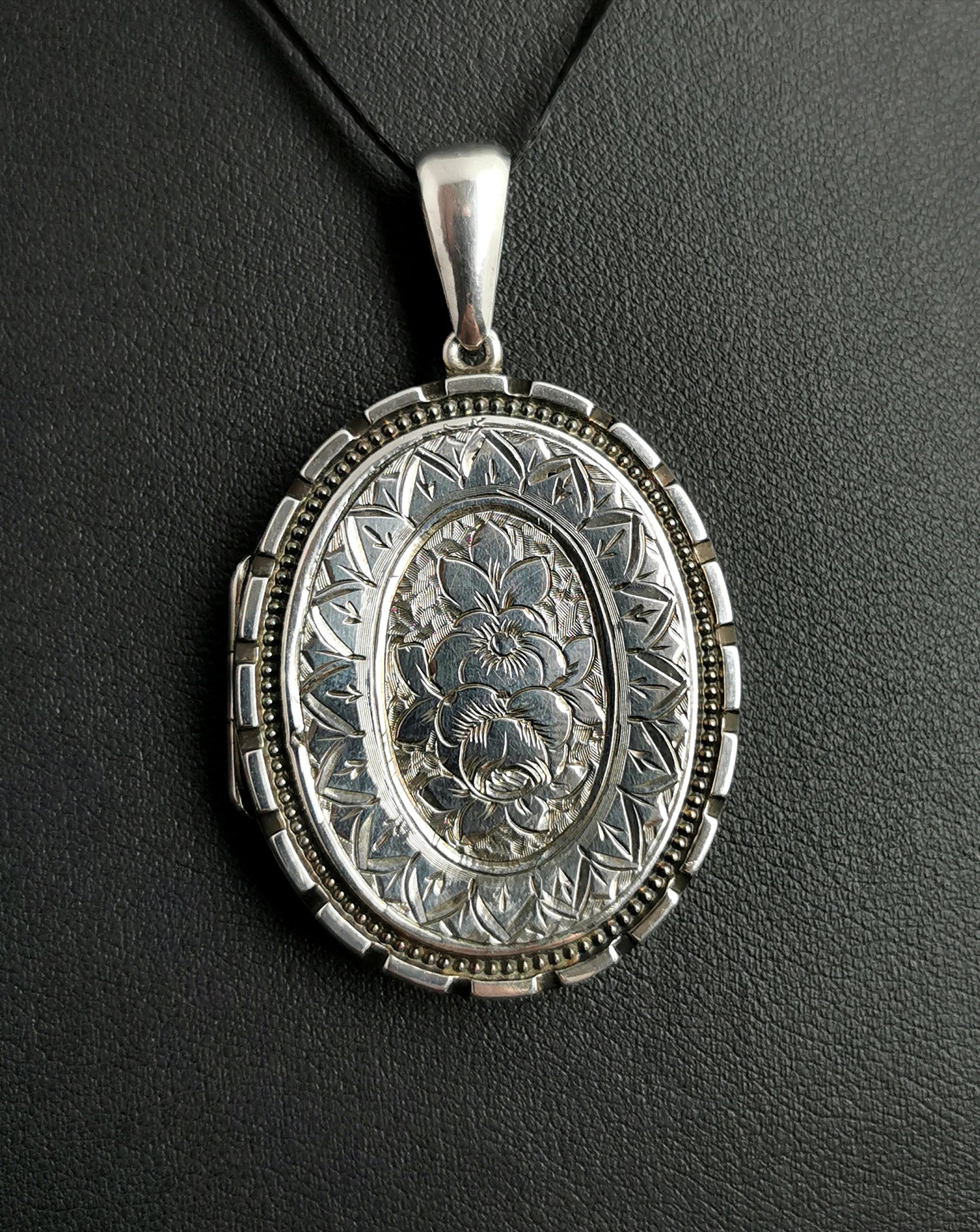 Victorian silver locket, pendant, Ivy and Floral engraved