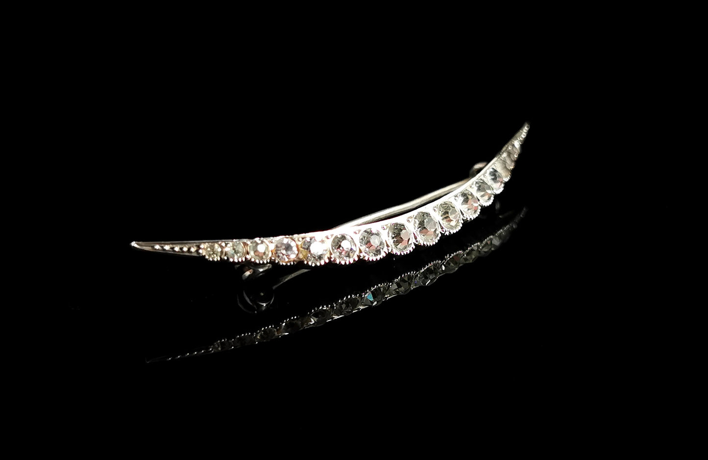 Antique silver and paste open crescent moon brooch