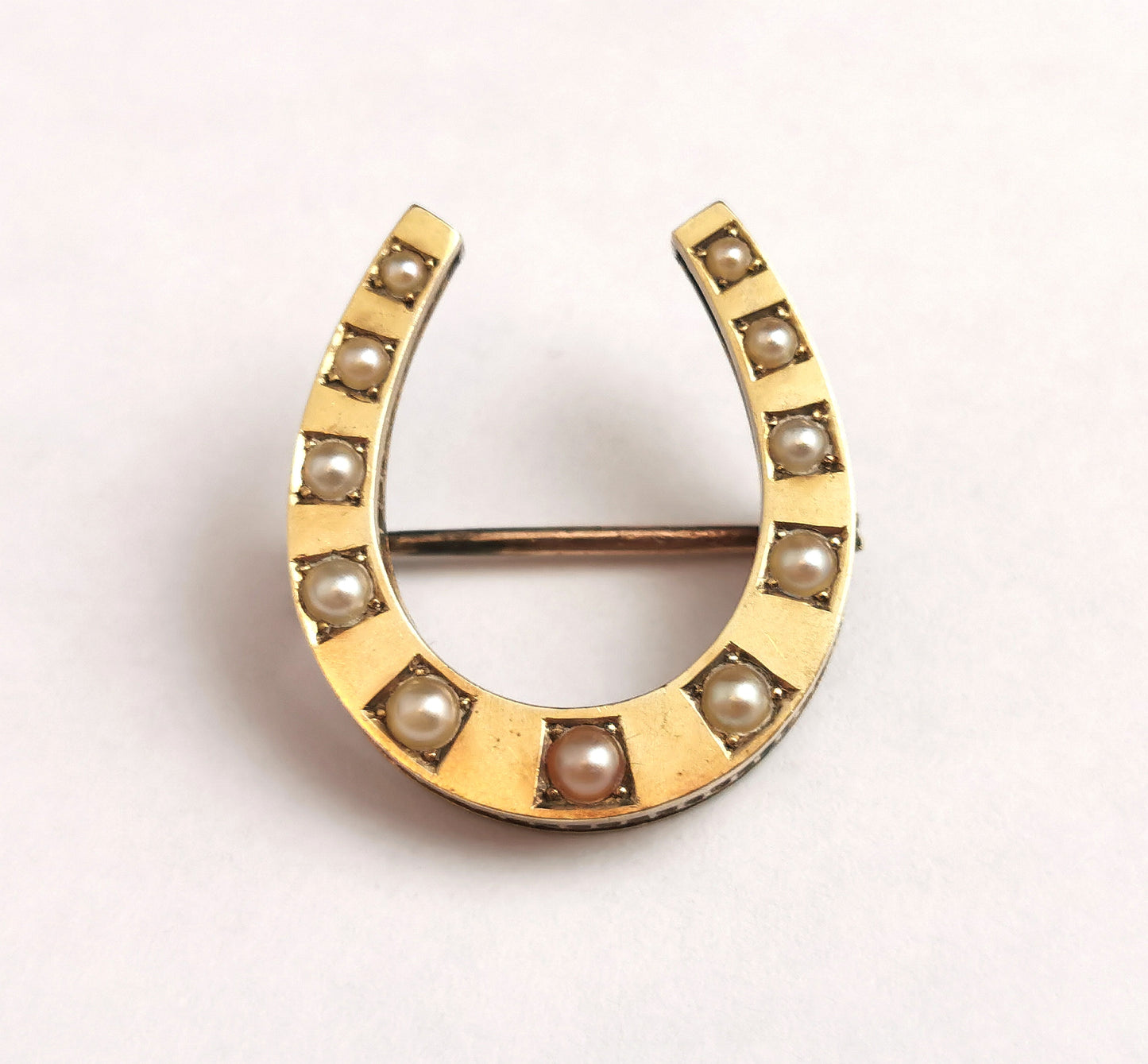 Antique 9ct gold Split pearl horseshoe brooch