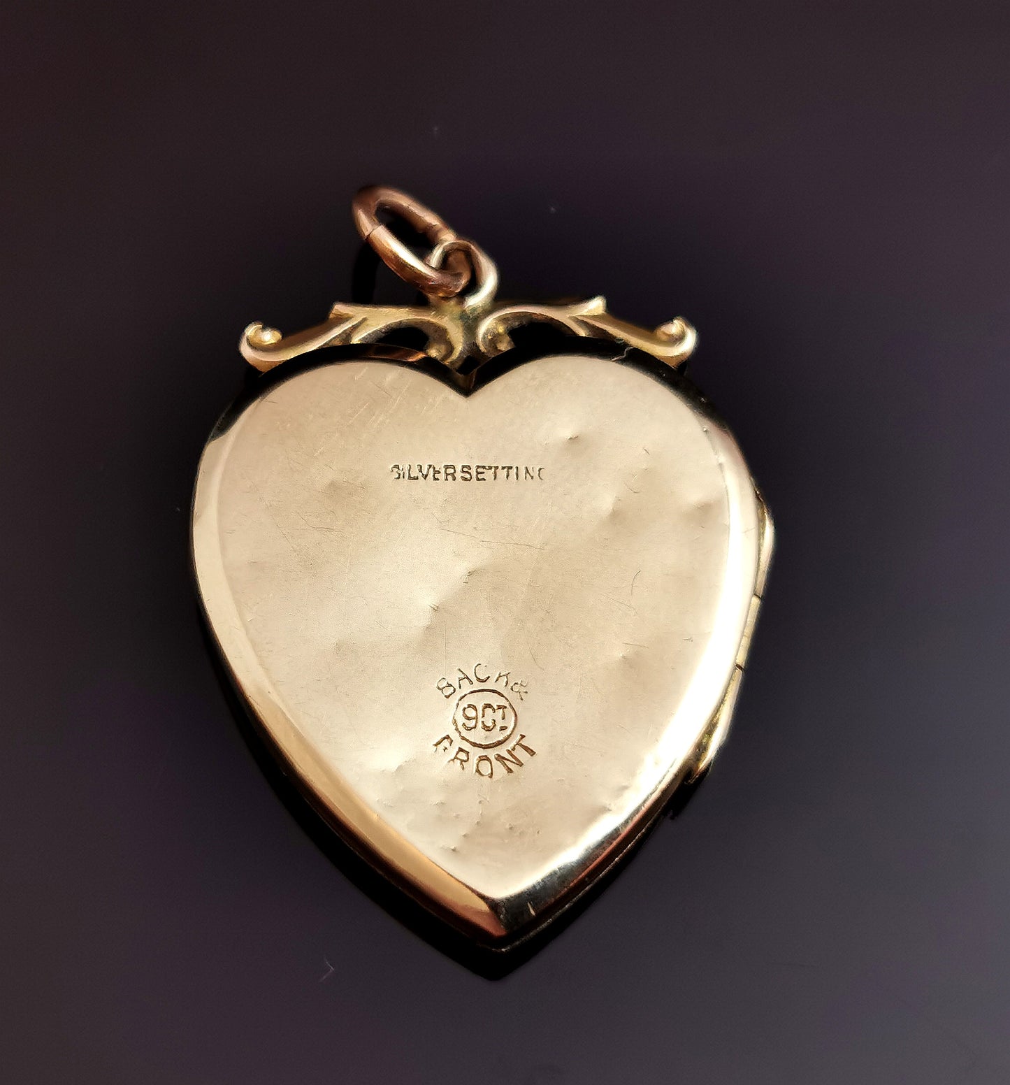 Antique heart shaped locket, 9ct gold front and back, paste star