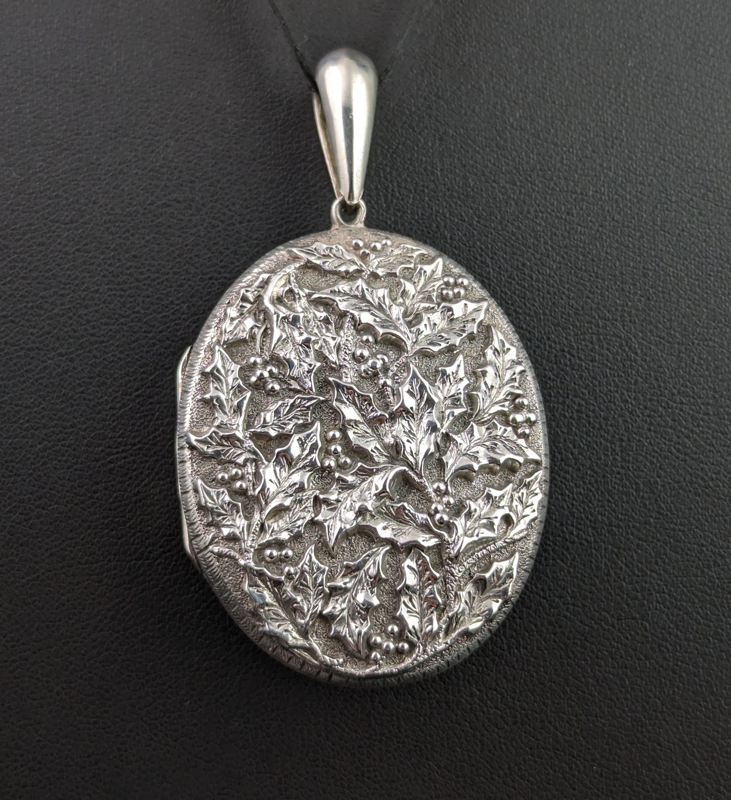 Antique Victorian silver locket pendant, Holly leaf