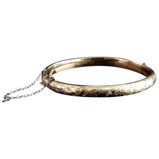 Art Deco 9ct gold bangle, floral engraved