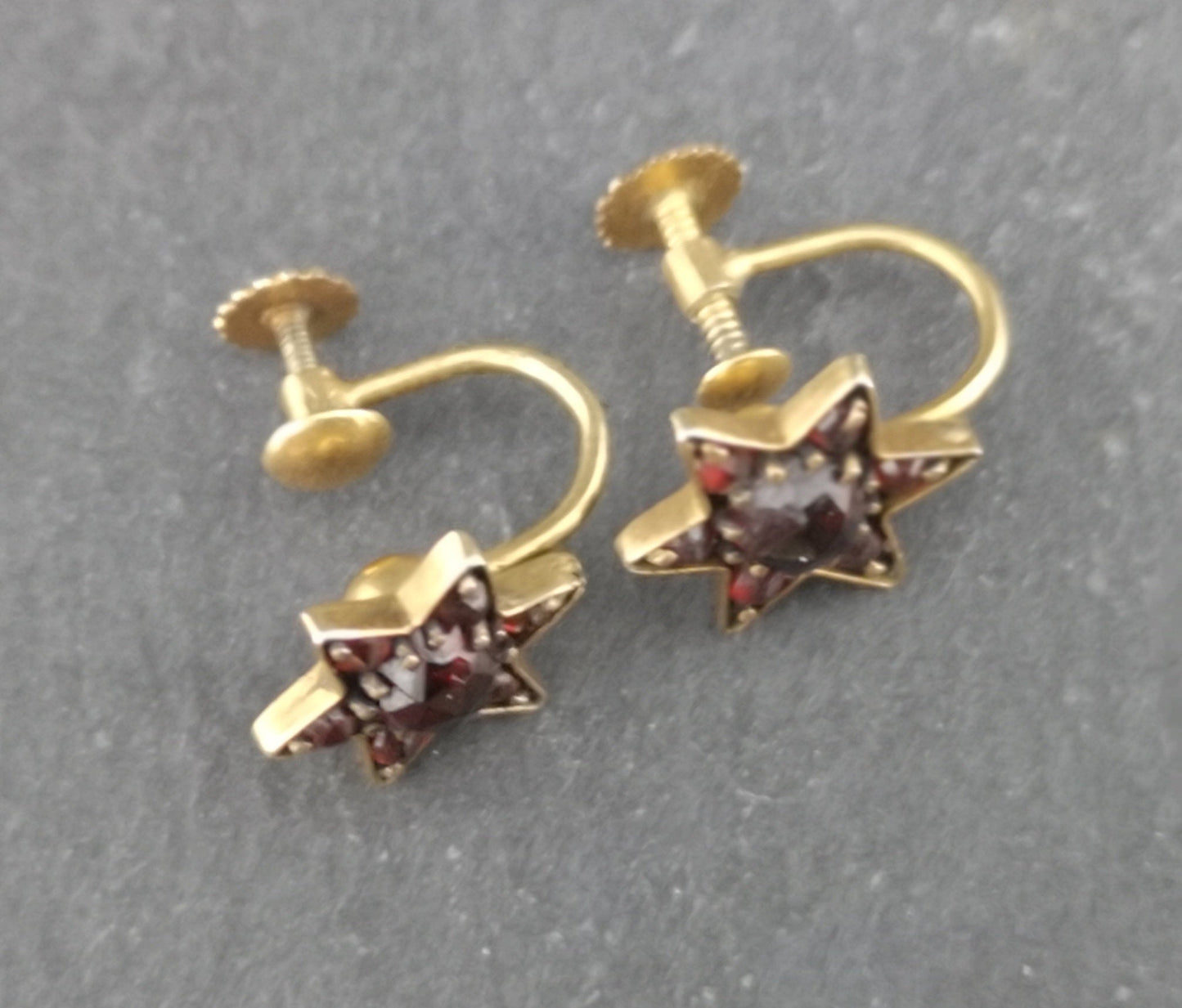 Antique Victorian bohemian garnet earrings, star, 9ct gold screw back