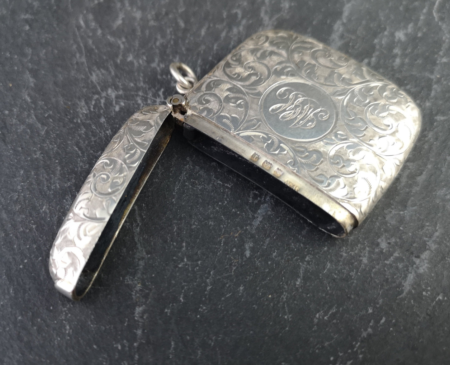 Antique sterling silver vesta case, engraved